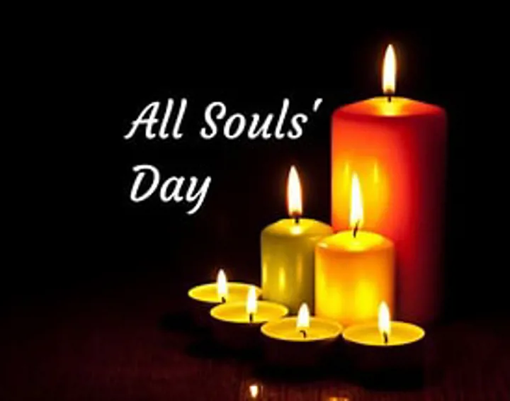 Picture of 3 burning candles with the wording All Souls' Day
