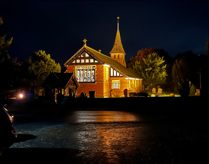 St Mary's Church after nightfall illuminated by spotlights 